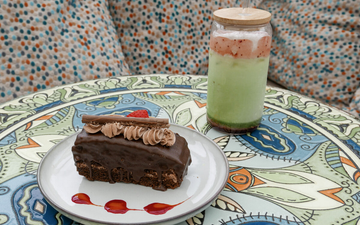 Chocolate Black Forest cake slice with cream and cherries at Mason's Apron