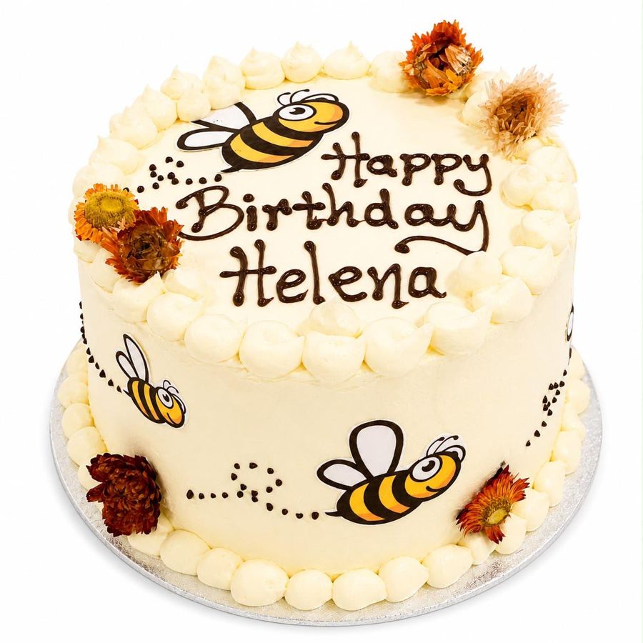 Birthday cake decorated with bees and dried flowers