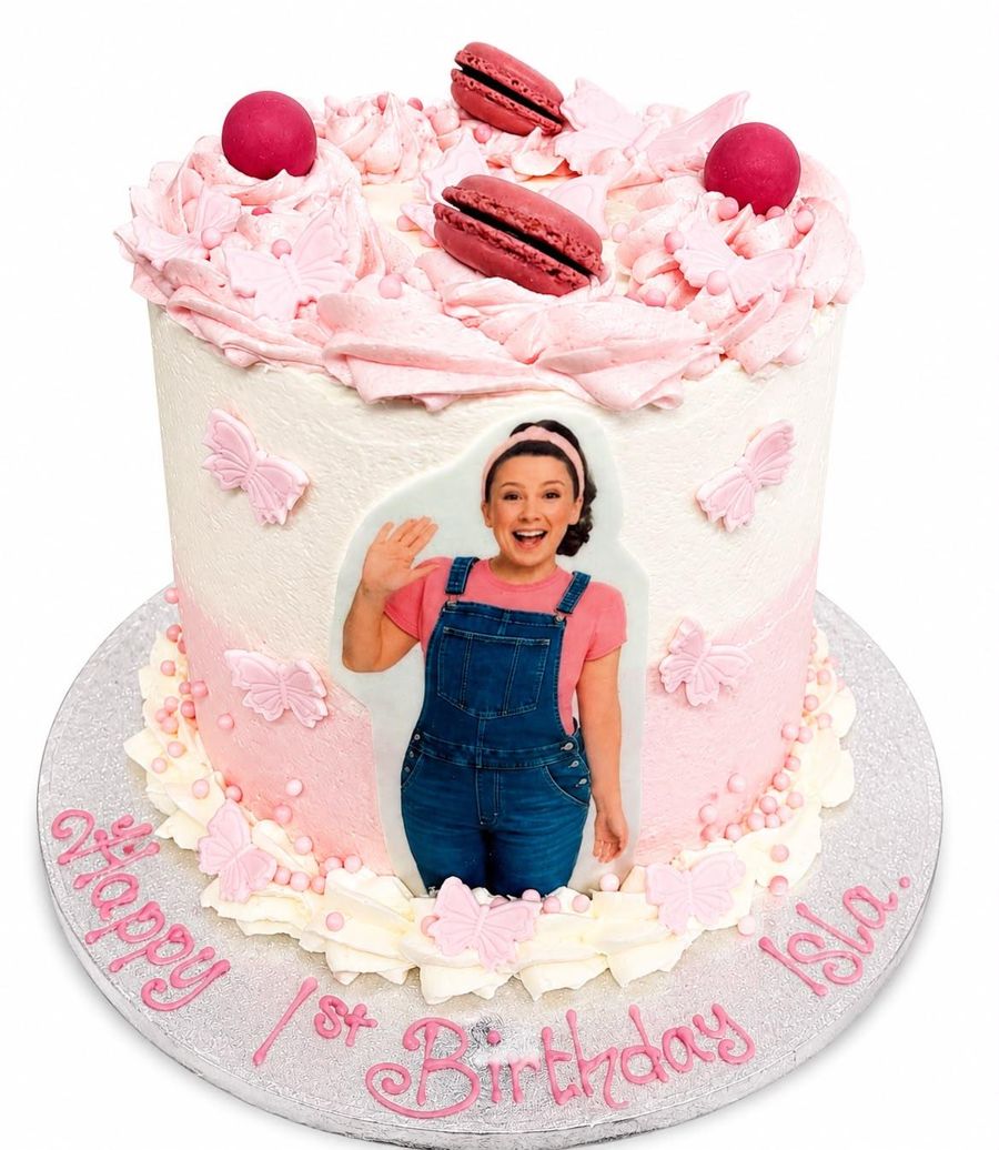 Pink first birthday cake with butterflies and edible photo image