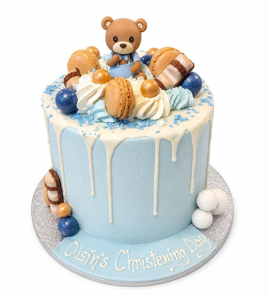 Blue christening drip cake with teddy bear topper
