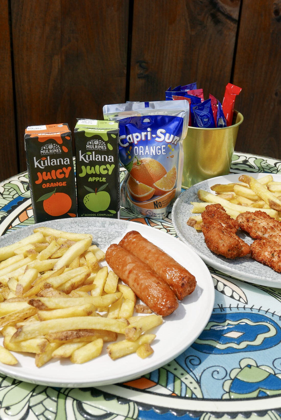 Kids' sausages and chips, chicken goujons and juice cartons at Mason's Apron